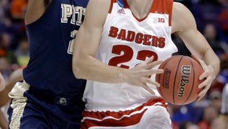 Next Story Image: No. 7 seed Wisconsin trudges past Pittsburgh, 47-43